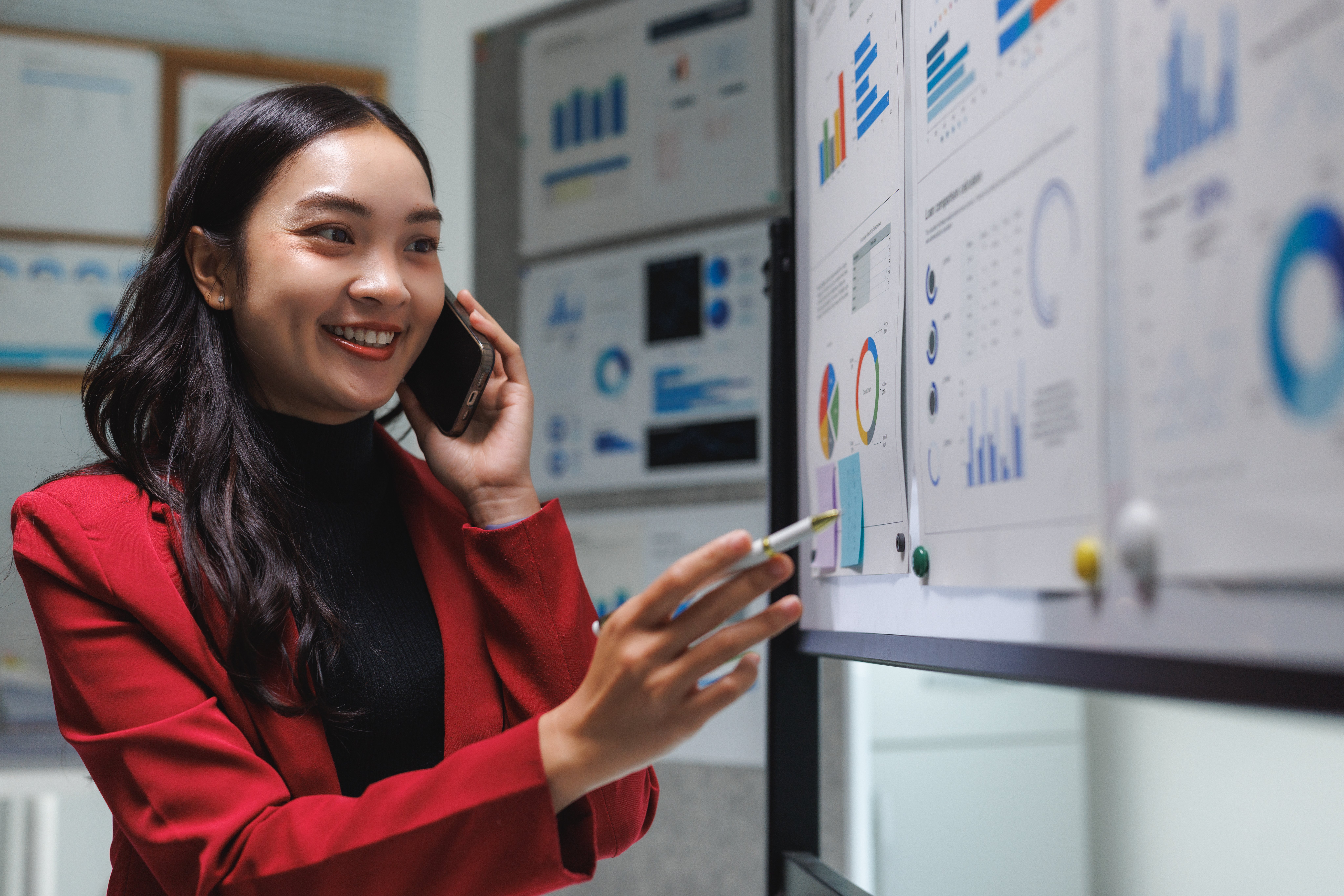 business-woman-analyzing-charts-in-modern-office-2026-03-15-00-46-22-utc