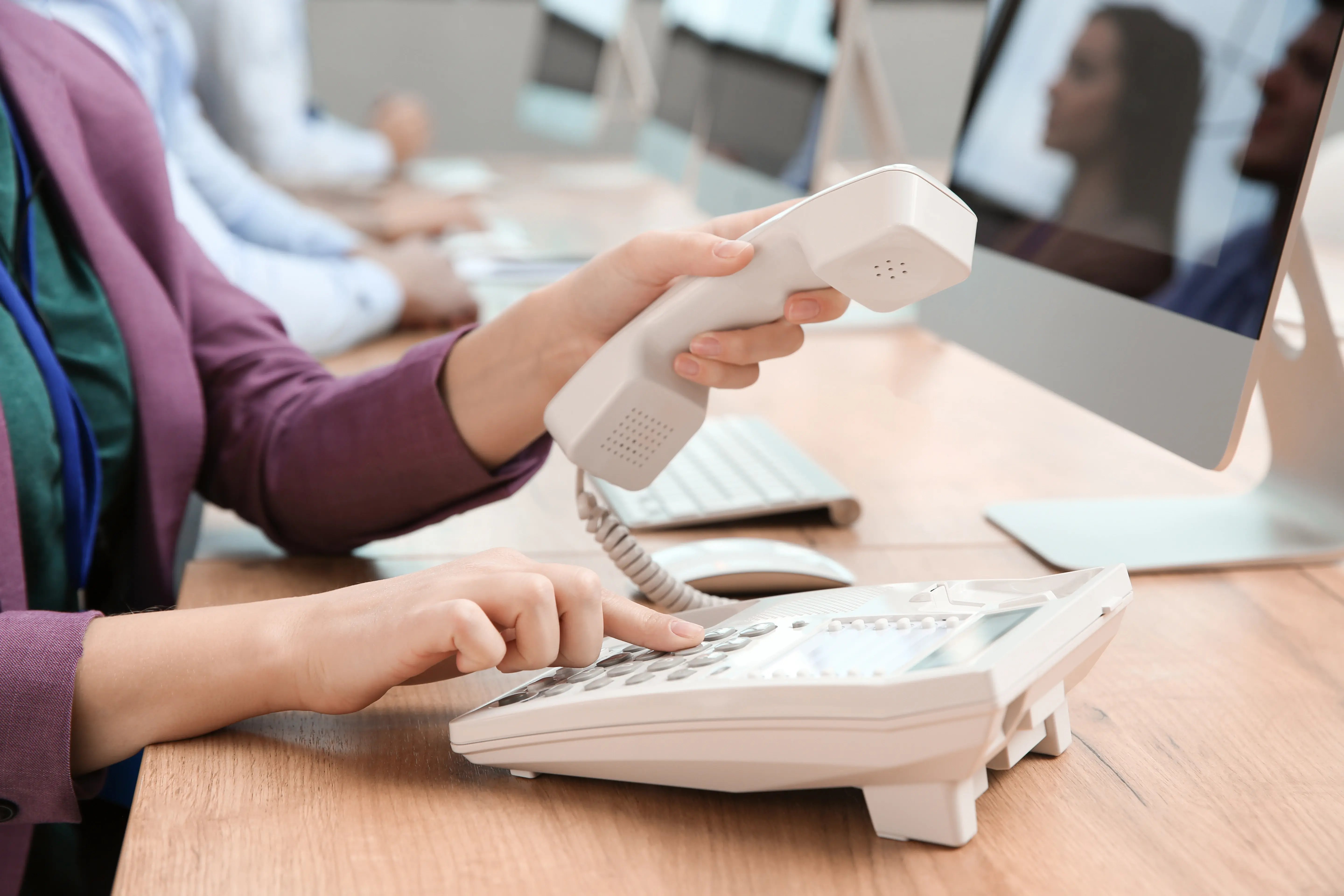 hands-dialing-phone-in-office-workplace-environmen-2026-03-05-16-37-30-utc