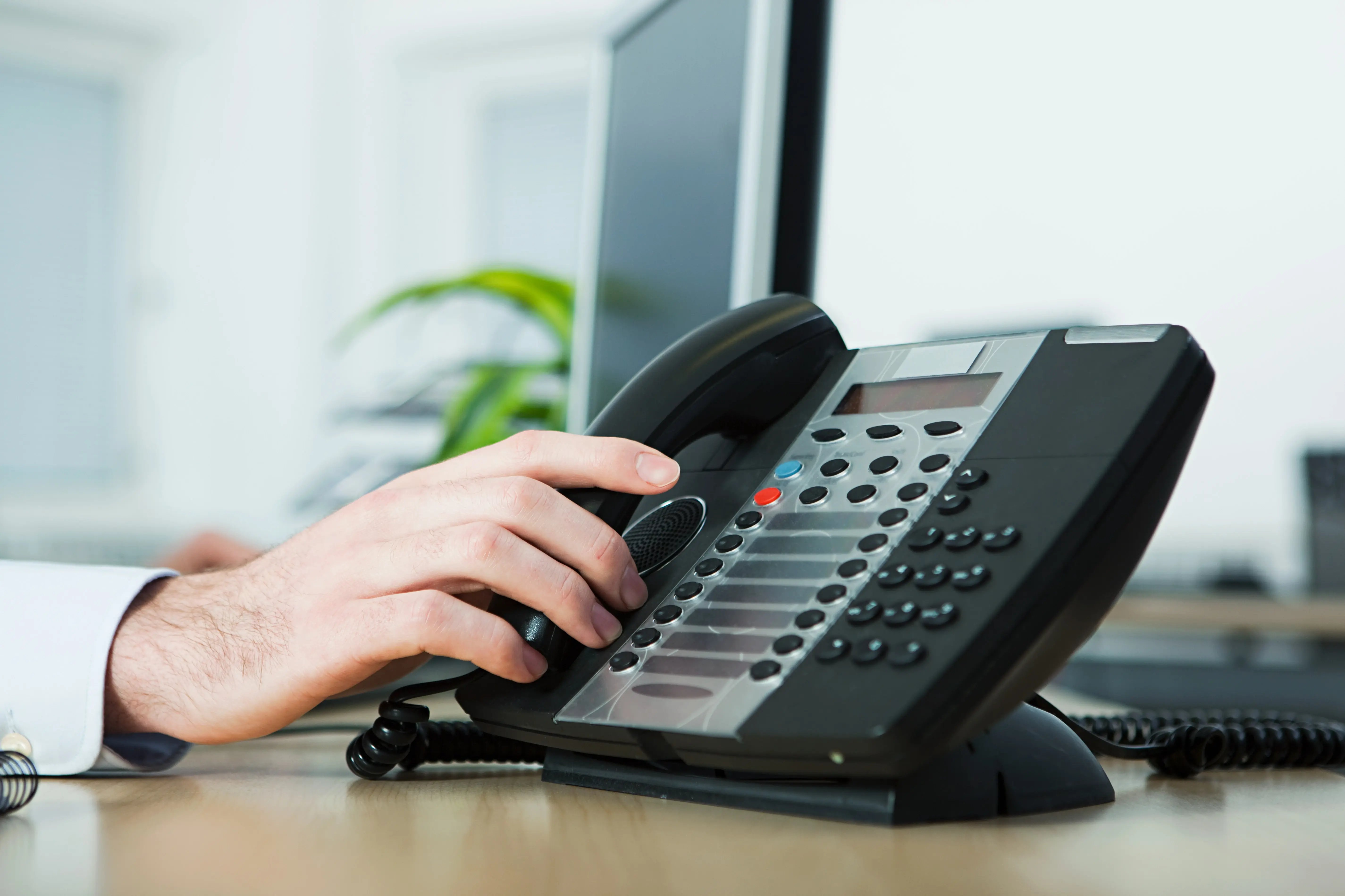 office-worker-answering-telephone-2026-01-09-10-38-43-utc