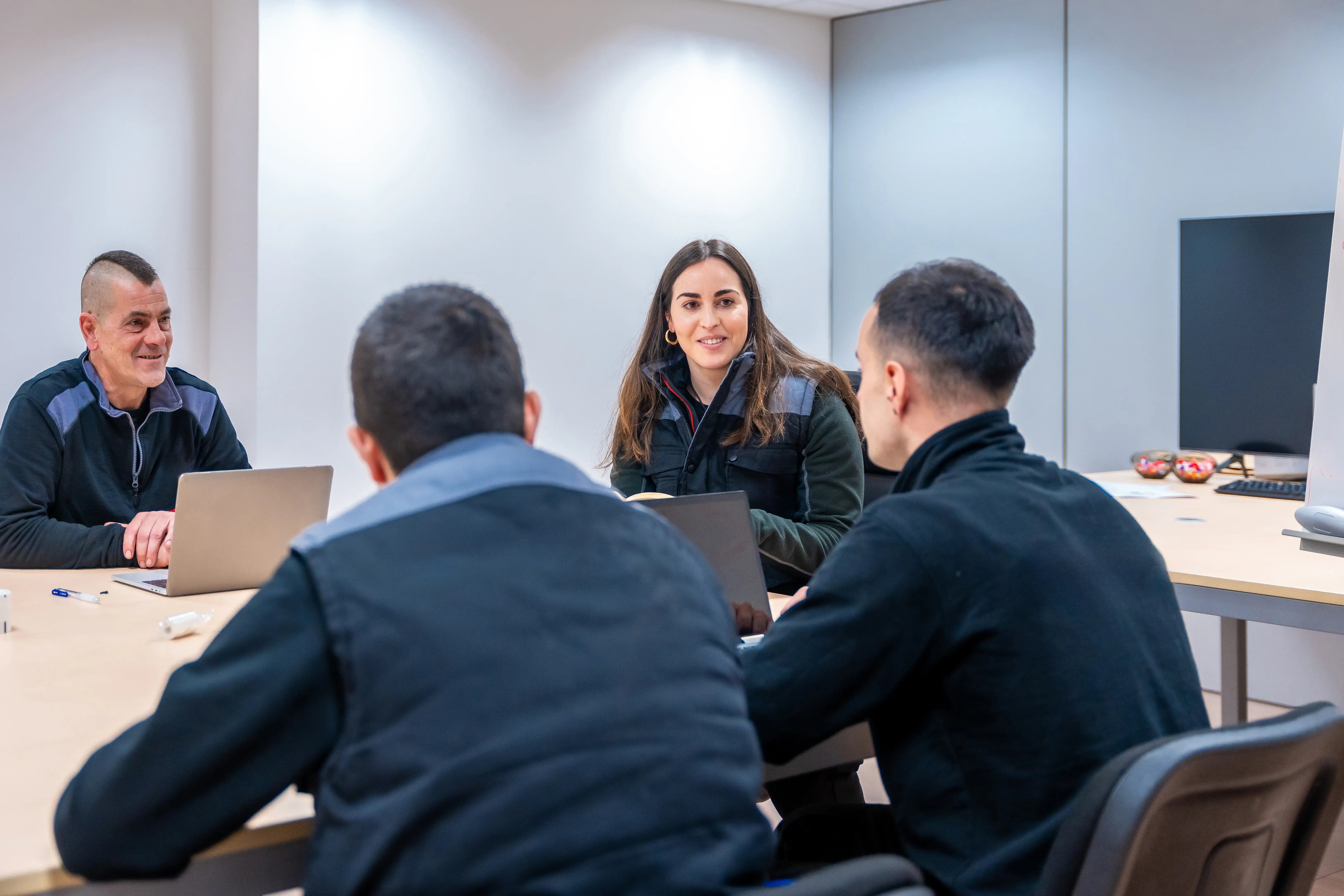 team-of-coworkers-during-a-meeting-in-room-of-fact-2026-01-06-10-14-35-utc