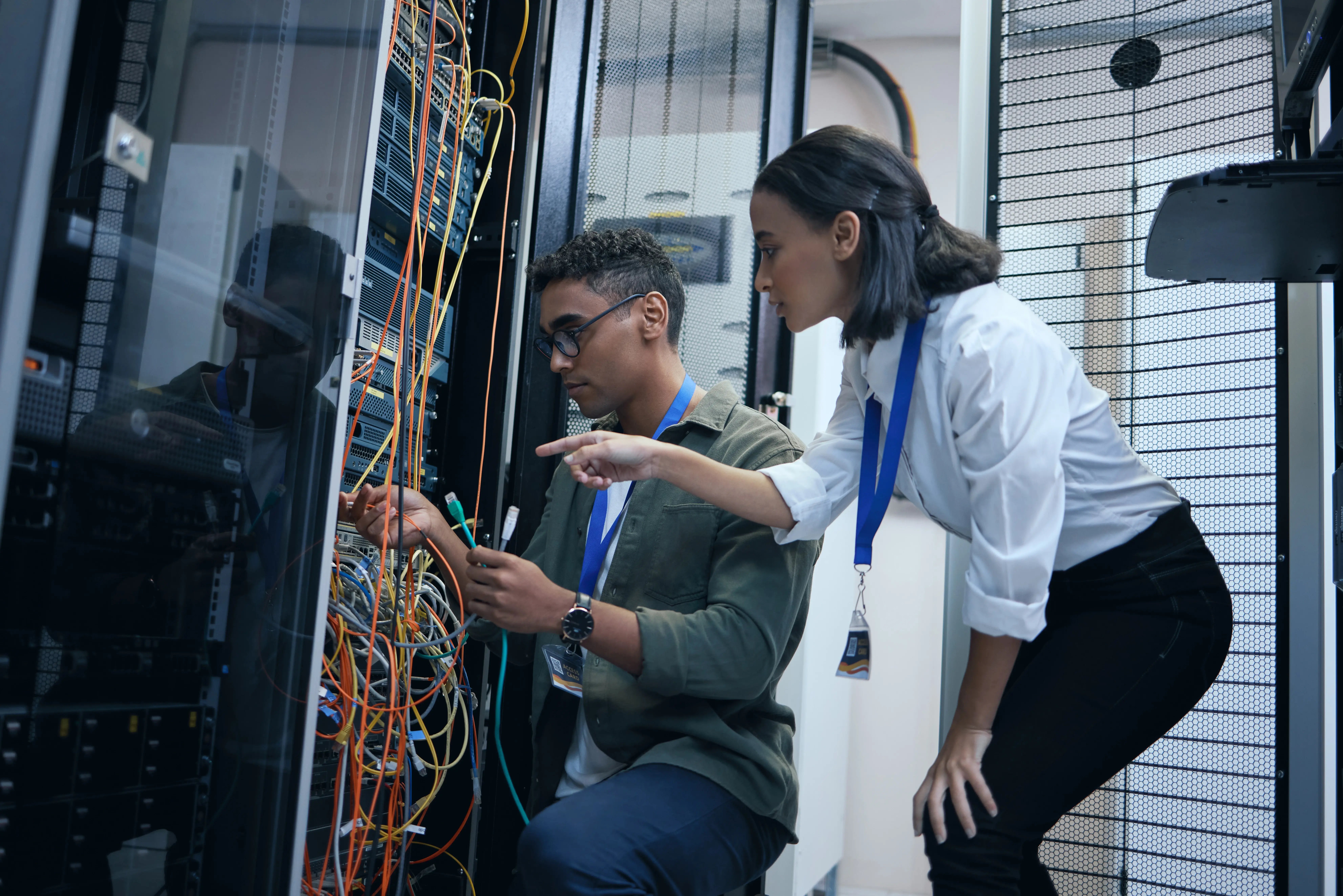 technicians-working-with-cables-in-server-room-2026-01-09-11-00-32-utc