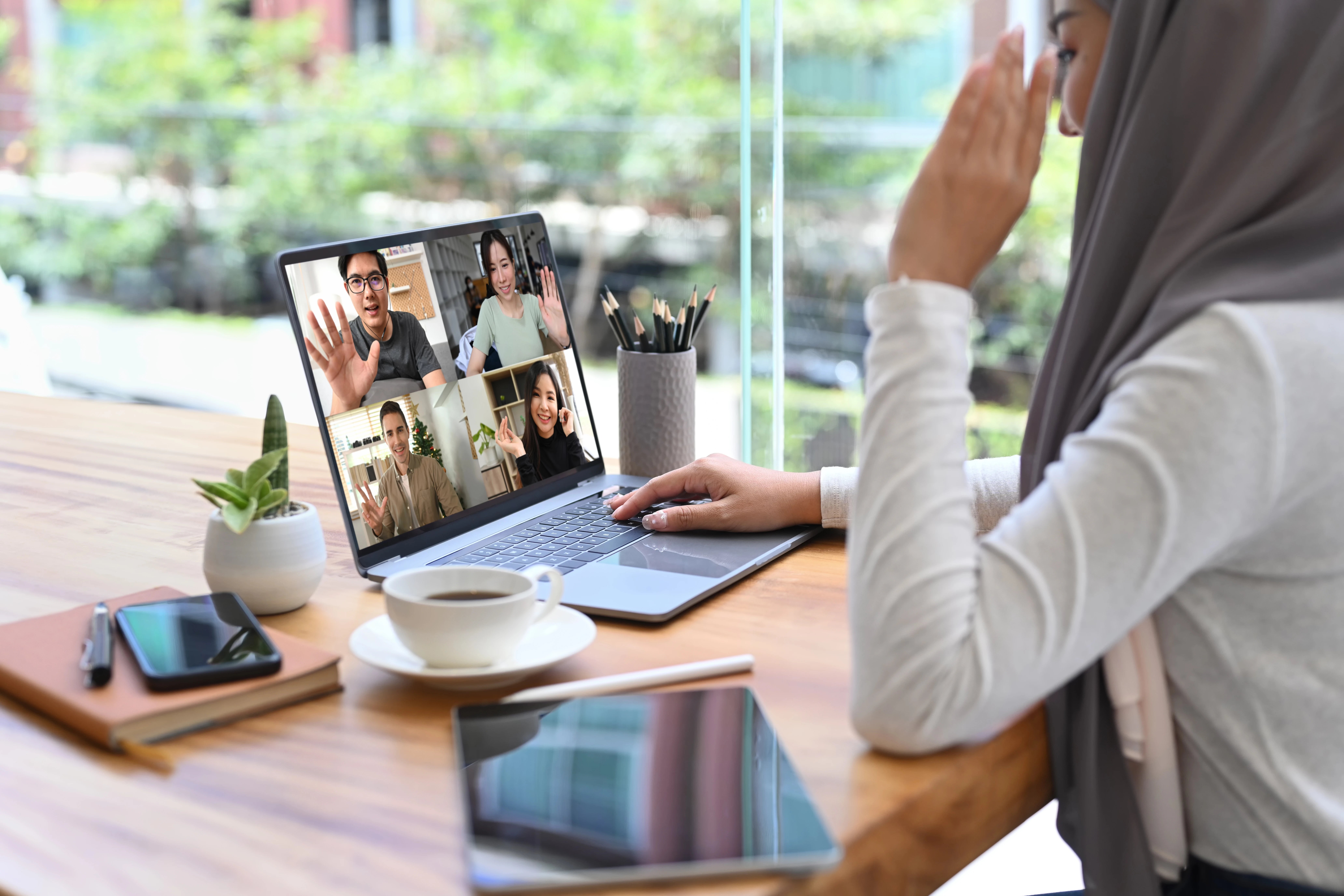 professional-woman-attending-virtual-meeting-at-wo-2026-03-15-23-23-48-utc